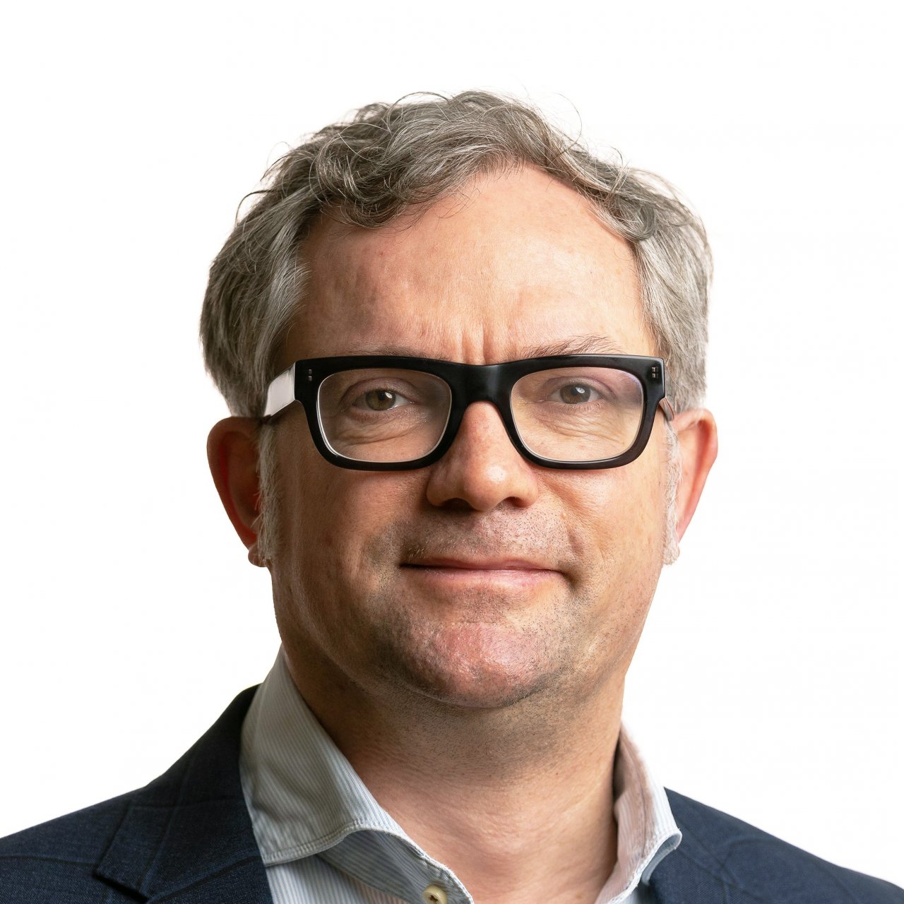 Headshot of symposium speaker Professor Damian Wild, M.D., PhD, an expert from the University Hospital Basel, Switzerland.