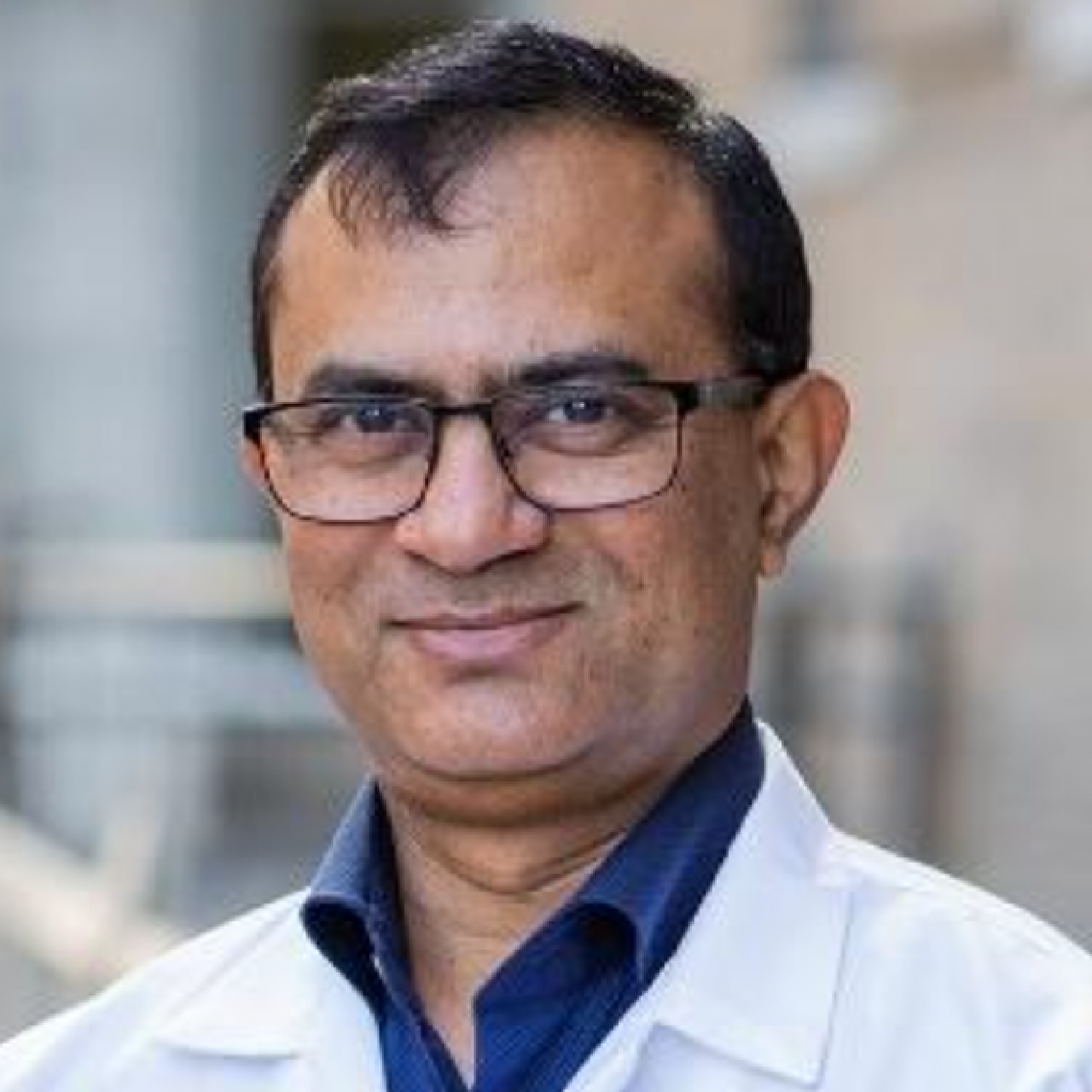 Headshot of symposium speaker Professor Vikas Prasad, M.D., PhD, an expert in Nuclear Medicine from the Mallinckrodt Institute of Radiology.